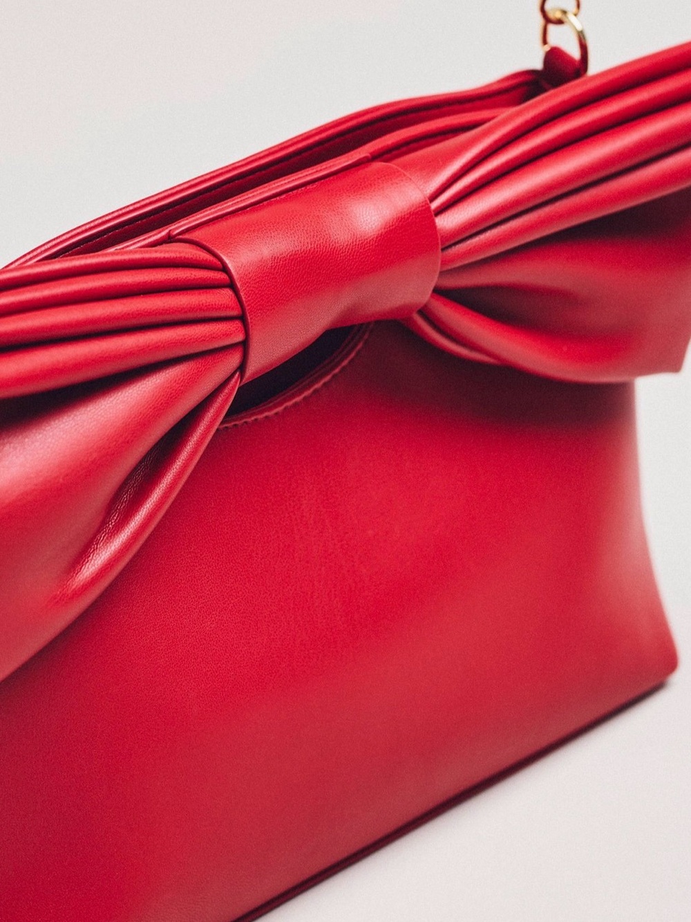 Anthropologie Cut Out Handle Bow Clutch in Red NWT